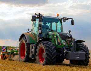 Tractor on field that uses transmission fluid from Inventory Express 