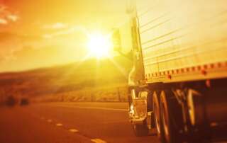 Heavy-duty truck operating in the sun with engine oil for warm weather conditions